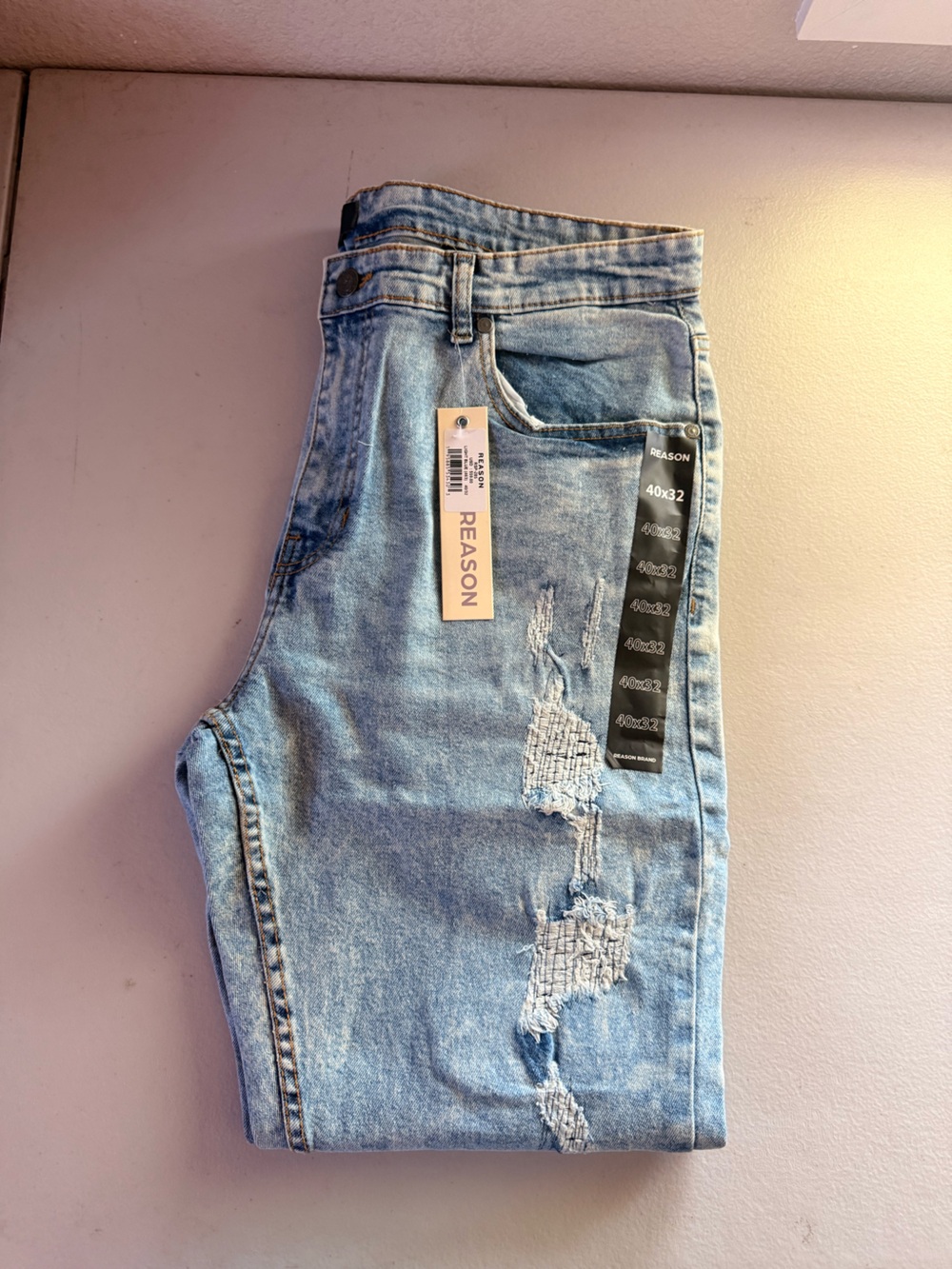 Reason Men’s Light Blue Slim Straight Jeans with Distressed Detail